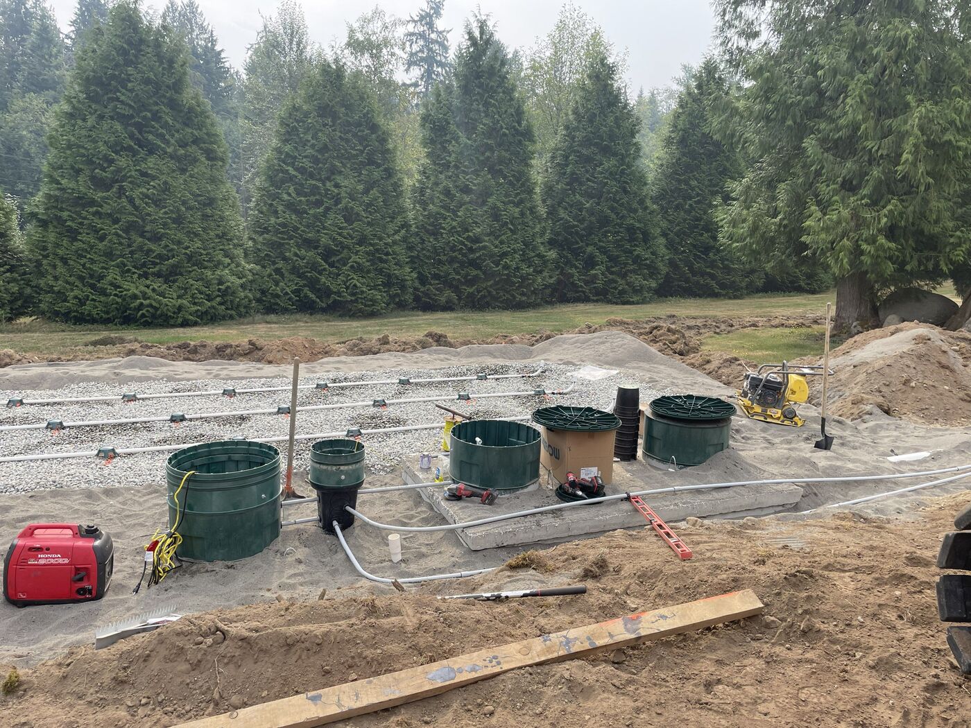 Septic tank installation beside a new residential build